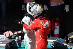 Race winner Sebastian Vettel, Ferrari and Valtteri Bottas, Mercedes AMG F1 celebrate in parc ferme