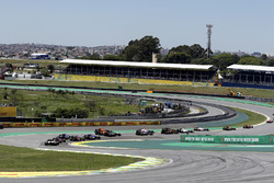 Kevin Magnussen, Haas F1 Team VF-17, Daniel Ricciardo, Red Bull Racing RB13 and Stoffel Vandoorne, McLaren MCL32 collide at the start of the race