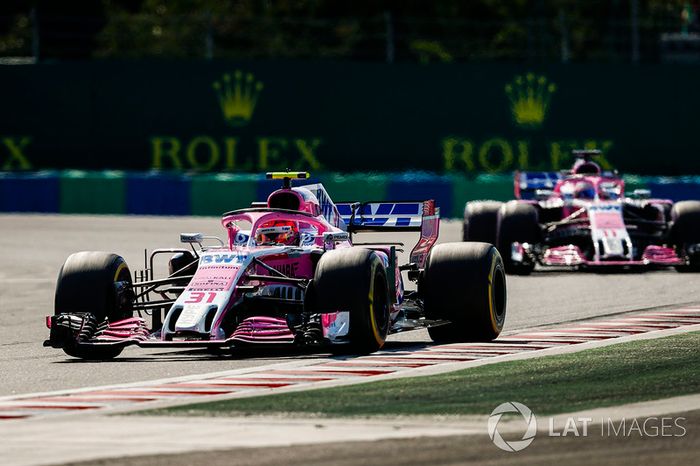Esteban Ocon, Force India VJM11, leads Sergio Perez, Force India VJM11