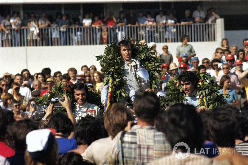 Podium: winner Jackie Stewart, second place Francois Cevert, third place Emerson Fittipaldi