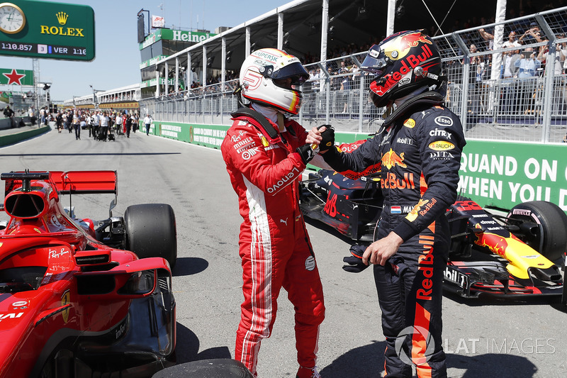 Le poleman Sebastian Vettel, Ferrari et Max Verstappen, Red Bull Racing dans le Parc Fermé