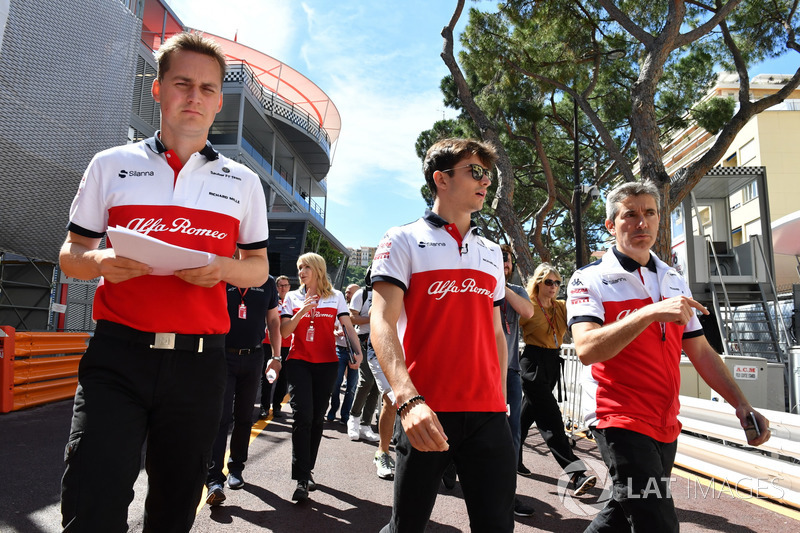 Charles Leclerc, Sauber and Xevi Pujolar, Sauber Head of Track Engineering walk the track