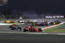 Sebastian Vettel, Ferrari SF-71H leads at the start of the race