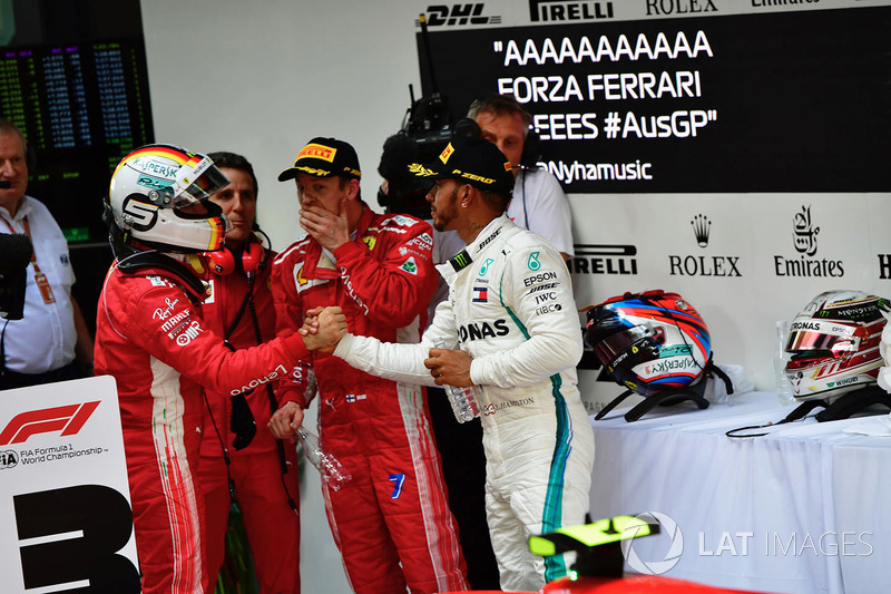 Sebastian Vettel, Ferrari and Lewis Hamilton, Mercedes-AMG F1 celebrate in parc ferme