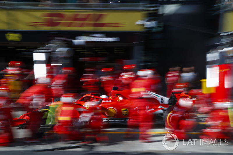 Sebastian Vettel, Ferrari SF71H, makes a pit stop