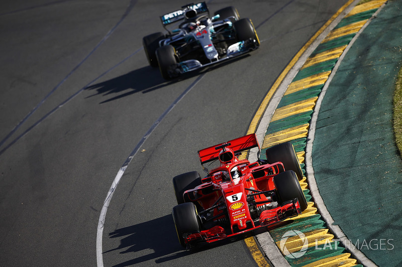 Sebastian Vettel, Ferrari SF71H, leads Lewis Hamilton, Mercedes AMG F1 W09