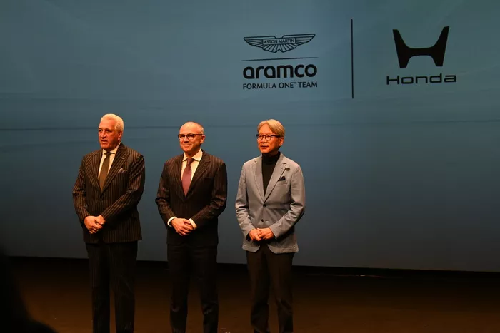 Stefano Domenicali, Lawrence Stroll, Toshihiro Mibe, director ejecutivo de Honda
