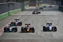 (L to R): Lewis Hamilton, Mercedes AMG F1 W07 Hybrid, Max Verstappen, Red Bull Racing RB12, and Valtteri Bottas, Williams FW38 battle for position