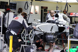 The Haas VF-16 of Romain Grosjean, Haas F1 Team is worked on in the second practice session