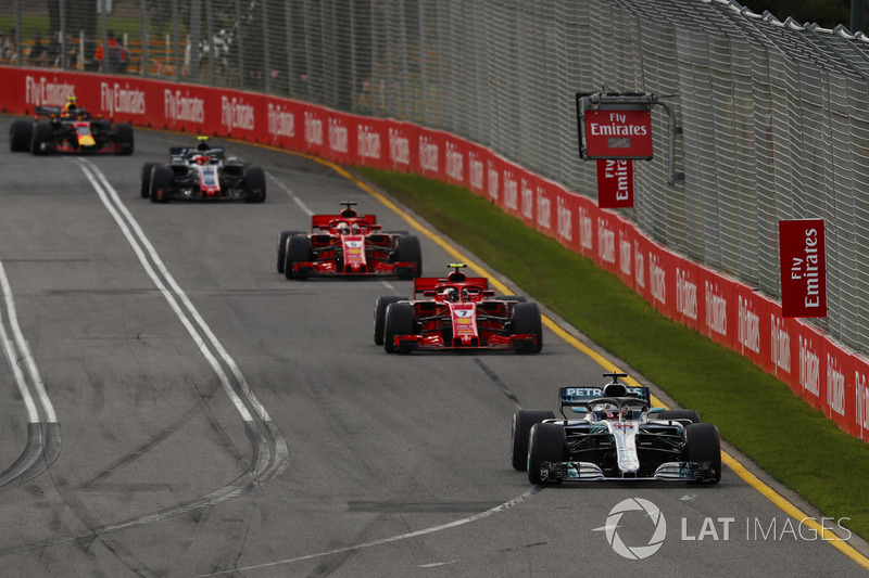 Lewis Hamilton, Mercedes AMG F1 W09, leads Kimi Raikkonen, Ferrari SF71H, Sebastian Vettel, Ferrari SF71H, Kevin Magnussen, Haas F1 Team VF-18 Ferrari, and Max Verstappen, Red Bull Racing RB14 Tag Heuer