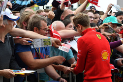 Sebastian Vettel, Ferrari signs autographs for the fans