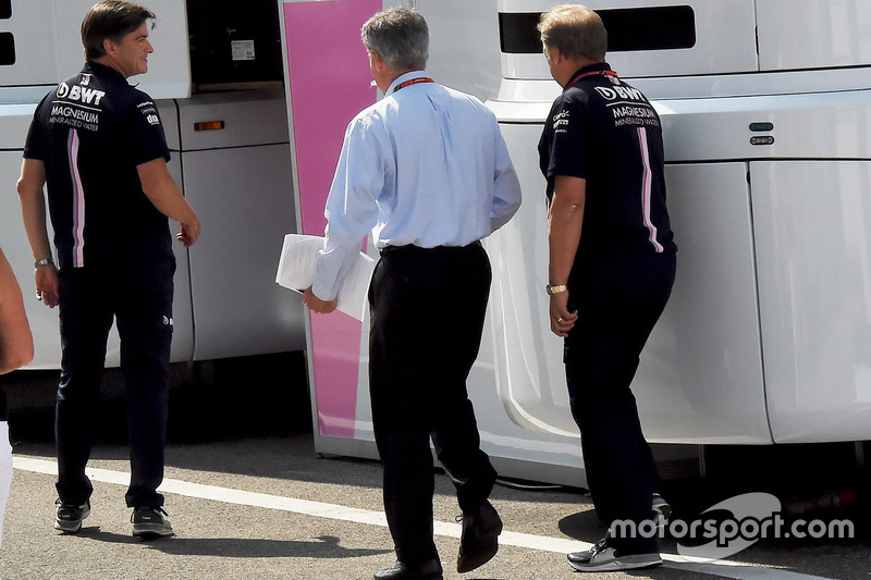 Chase Carey, Chief Executive Officer and Executive Chairman of the Formula One Group with Robert Fearnley, Force India F1 Team Deputy Team Principal and Andy Stevenson, Force India F1 Team Manager Jose Rubio