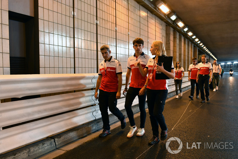 Charles Leclerc, Sauber walks the track through the tunnel with Xevi Pujolar, Sauber Head of Track Engineering and Ruth Buscombe, Sauber Race Strategist