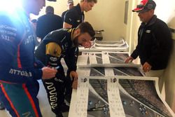 Drivers sign Justin Wilson poster