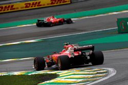 Kimi Raikkonen, Ferrari SF70H and Sebastian Vettel, Ferrari SF70H