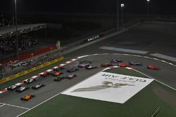 Sebastian Vettel, Ferrari SF71H leads at the start of the race