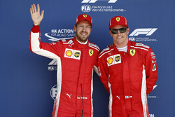 Sebastian Vettel, Ferrari, and Kimi Raikkonen, Ferrari, celebrate after qualifying