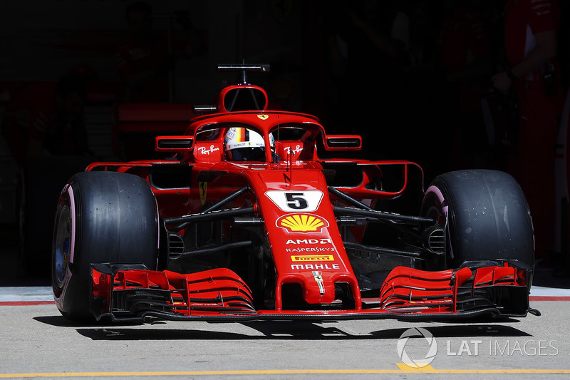 Sebastian Vettel, Ferrari SF71H, exits his pit garage