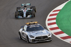 The Safety Car leads Lewis Hamilton, Mercedes AMG F1 W09