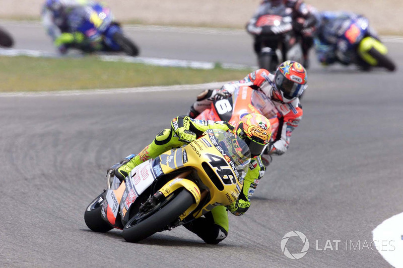 <img src="http://cdn-1.motorsport.com/static/custom/car-thumbs/MOTOGP_2017/RIDERS_NUMBERS/Rossi.png" width="55" /> #5 GP500cc Spanyol 2001