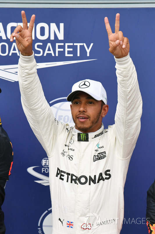 Pole sitter Lewis Hamilton, Mercedes AMG F1 celebrates in parc ferme