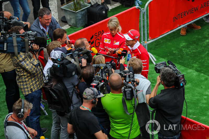 Sebastian Vettel, Ferrari, with Britta Roeske, in parc ferme