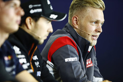Kevin Magnussen, Haas F1 Team, Sergio Perez, Force India and Max Verstappen, Red Bull Racing, in the