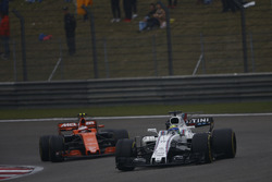 Felipe Massa, Williams FW40, leads Stoffel Vandoorne, McLaren MCL32