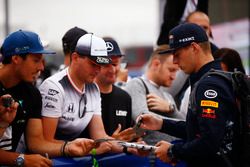 Max Verstappen, Red Bull Racing, signs autoraphs for fans