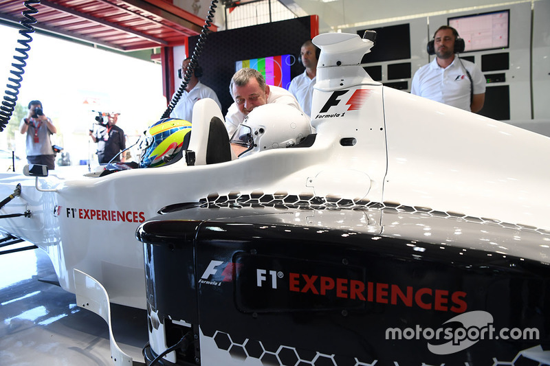 Zsolt Baumgartner, F1 Experiences 2-Seater driver and F1 Experiences 2-Seater passenger Will Buxton, NBC TV Presenter
