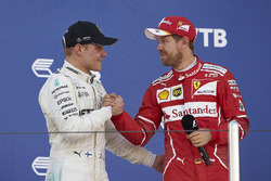Second place Sebastian Vettel, Ferrari, congratulates Race winner Valtteri Bottas, Mercedes AMG F1
