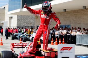 Kimi Raikkonen, Ferrari SF71H, celebrates in Parc Ferme after winning the race