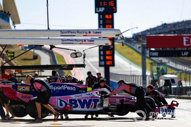 Lance Stroll, Racing Point RP19, is returned to the garage