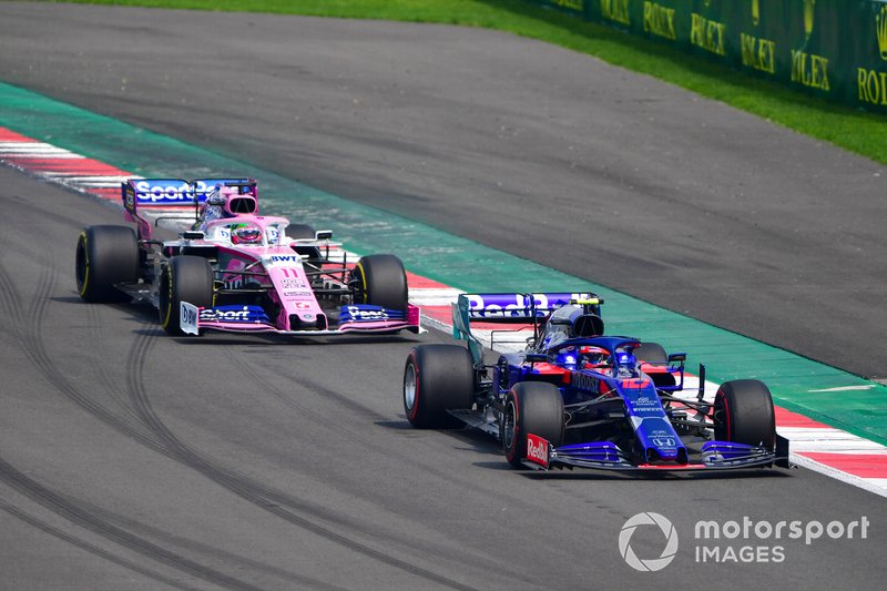 Pierre Gasly, Toro Rosso STR14, leads Sergio Perez, Racing Point RP19