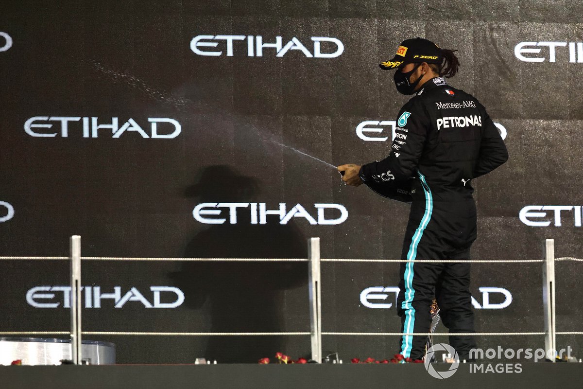 Lewis Hamilton, Mercedes-AMG F1, 3rd position, sprays Champagne on the podium