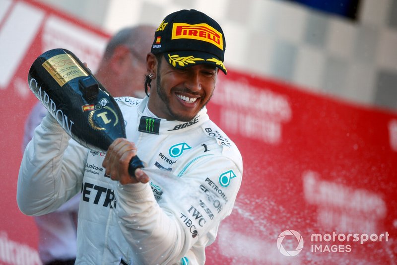 Lewis Hamilton, Mercedes AMG F1, 1st position, sprays Champagne on the podium