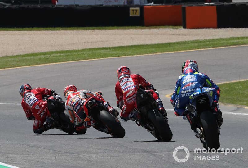 Danilo Petrucci, Ducati Team leads Marc Marquez, Repsol Honda Team