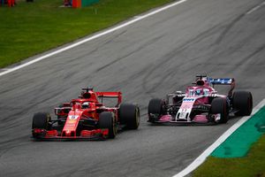 Sebastian Vettel, Ferrari SF71H, leads Sergio Perez, Racing Point Force India VJM11