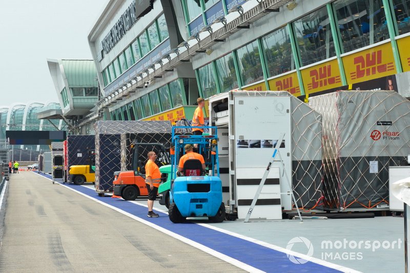 Freight belonging to the Haas team in the pit lane