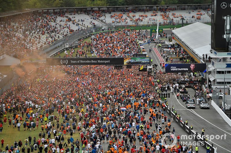 Fans invade the circuit after the race