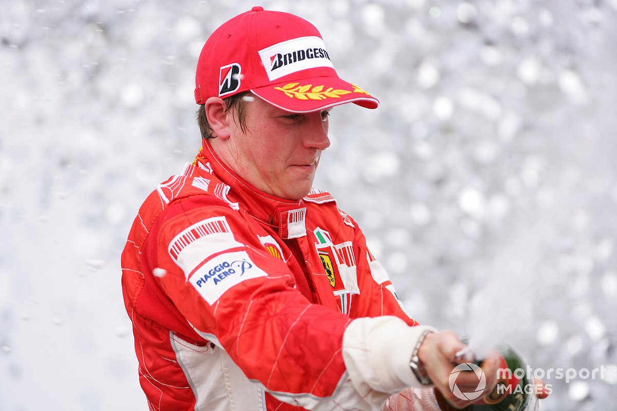 Kimi Raikkonen, Ferrari F2007, celebrates on the podium