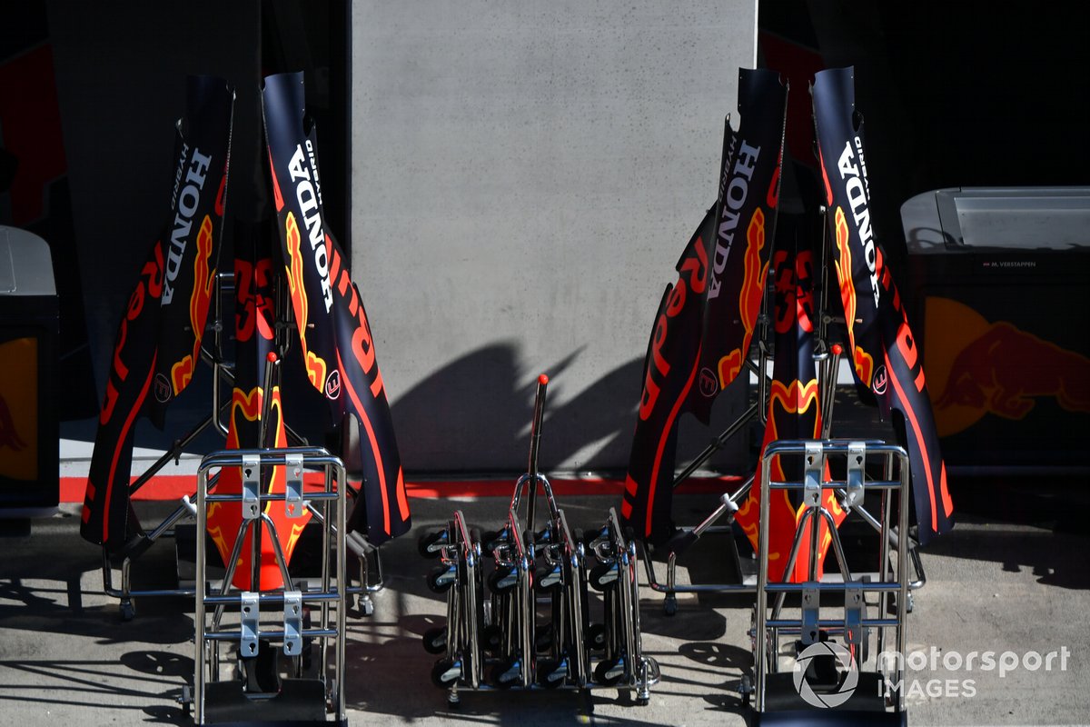 Bodywork in the pit lane outside of the Red Bull Honda garage