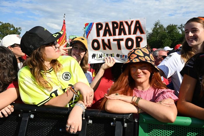 Fans hold up a sign in support of McLaren