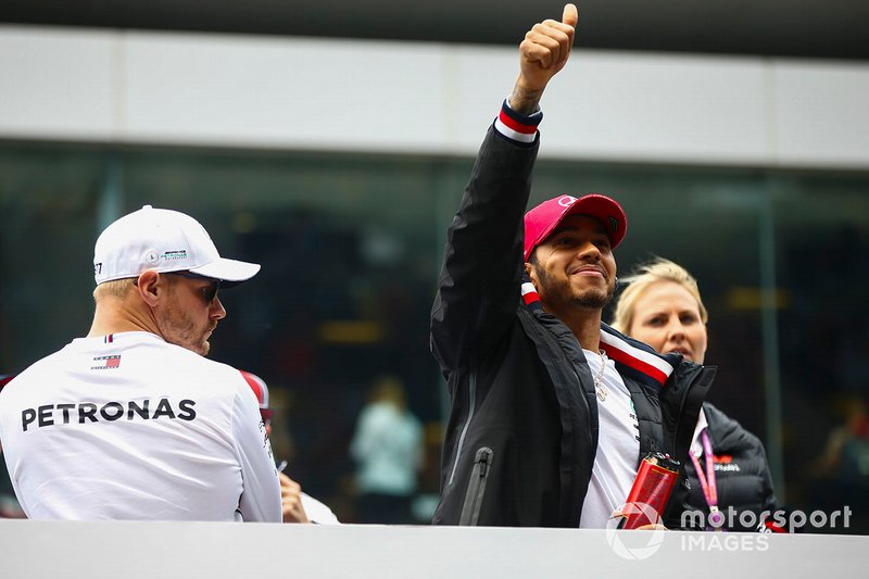 Valtteri Bottas, Mercedes AMG F1, and Lewis Hamilton, Mercedes AMG F1, in the drivers parade