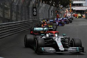 Valtteri Bottas, Mercedes AMG W10, leads Pierre Gasly, Red Bull Racing RB15, Carlos Sainz Jr., McLaren MCL34, and Daniil Kvyat, Toro Rosso STR14