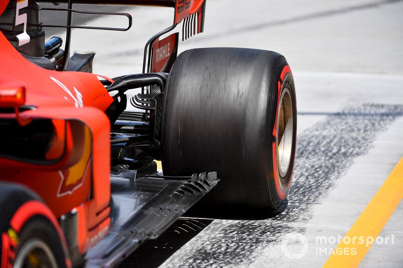 Sebastian Vettel, Ferrari SF90, spins in the pit lane