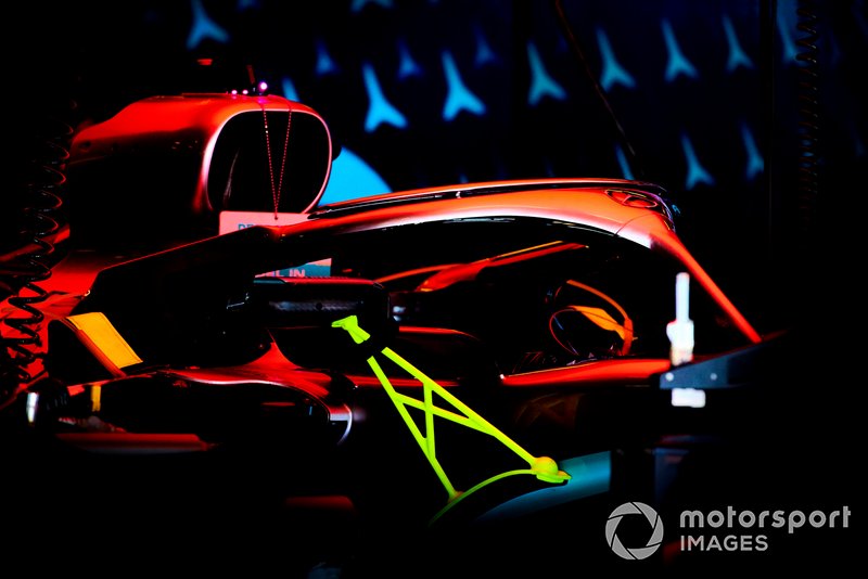Mercedes AMG F1 W10 in the garage at night
