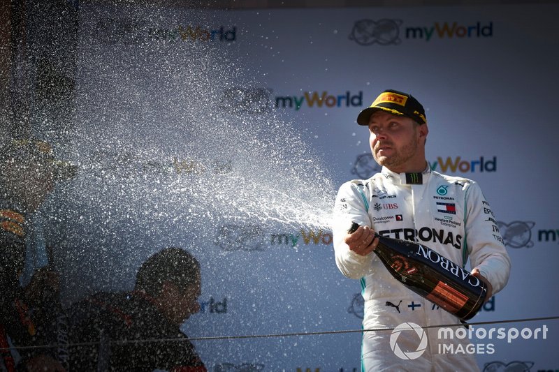 Valtteri Bottas, Mercedes AMG F1, 3rd position, sprays Champagne on the podium