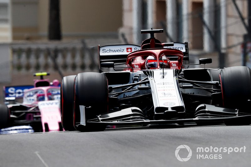 Kimi Raikkonen, Alfa Romeo Racing C38, leads Lance Stroll, Racing Point RP19