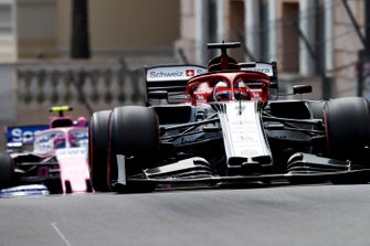 Kimi Raikkonen, Alfa Romeo Racing C38, leads Lance Stroll, Racing Point RP19
